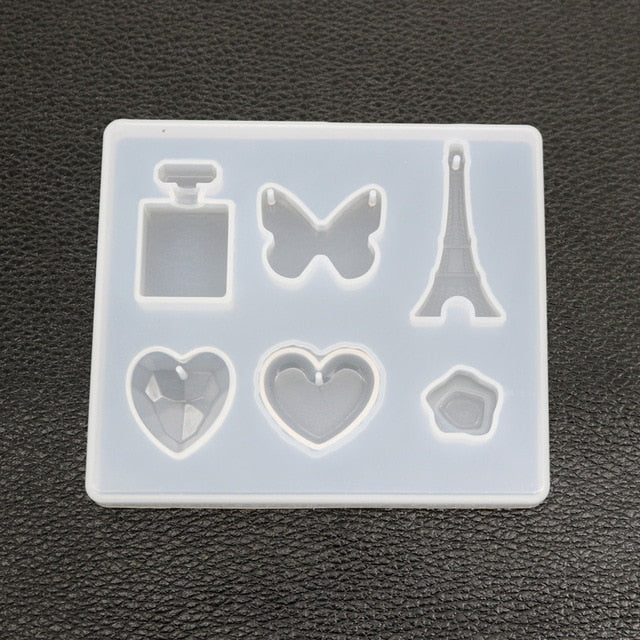 A variety of heart-shaped round oval rectangular silicone stud molds Mixed jewelry epoxy resin molds DIY jewelry making tools